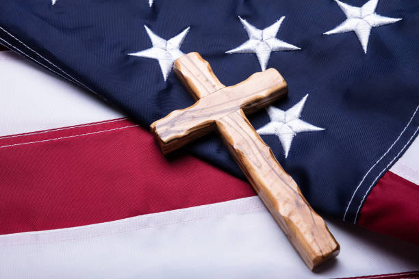 istock Cross On American Flag 1322052145