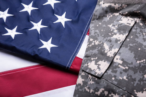istock Military Uniform On American Flag 1322052147