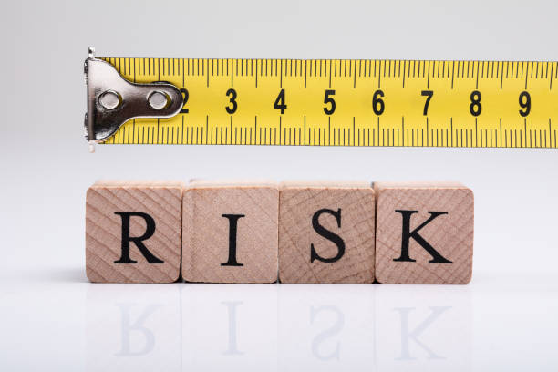 istock Measure Tape Over Risk Wooden Blocks 1322052163