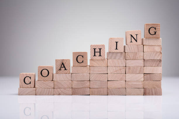 istock Coaching Word On Wooden Blocks 1322052168