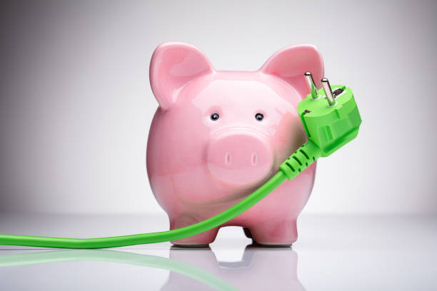 istock Piggy Bank With Power Plug 1322052185