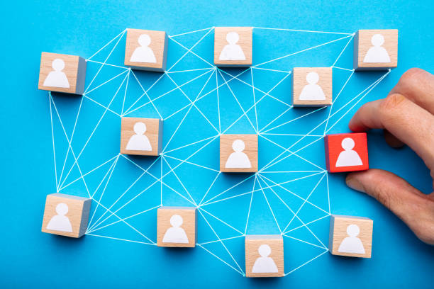 istock Connecting Icon Peoples Wooden Cube Blocks 1322052259