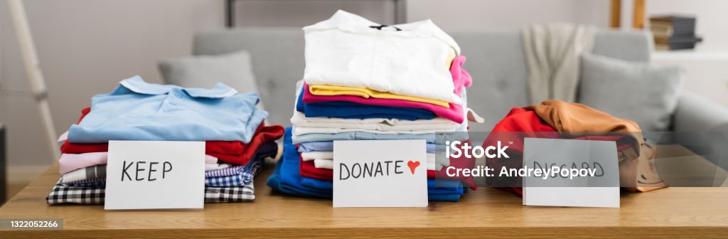 Declutter Clothes Wardrobe Declutter Clothes Wardrobe. Keep And Donate Fashion Decluttering Stock Photo