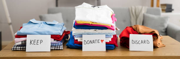 Declutter Clothes Wardrobe Declutter Clothes Wardrobe. Keep And Donate Fashion wardrobe stock pictures, royalty-free photos & images