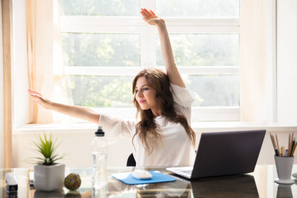 istock Businesswoman Stretching Her Arms 1322054900
