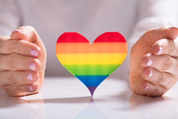 istock Woman Protecting Heart Shape 1322055102