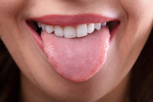 istock Woman Showing Her Tongue 1322055867