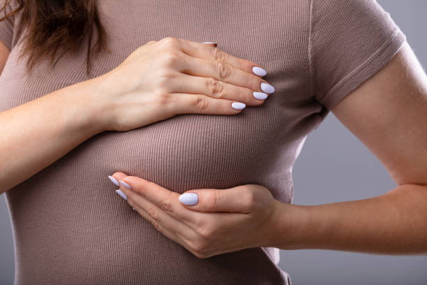 istock Woman Suffering From Breast Pain 1322055881
