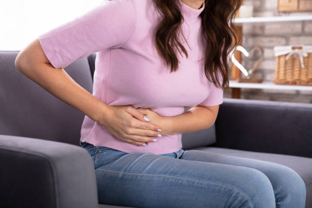 istock Woman Suffering From Stomach Pain 1322055933