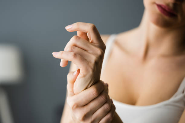 istock Wrist Pain Holding 1322057170