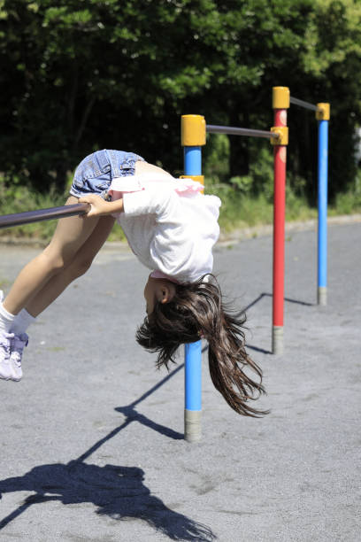 istock Japanese student girl playing with flying fox (6 years old) 1322057860