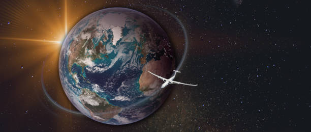 istock Transcontinental flight. Plane flies around the planet Earth. Starry space with copy space at the background. Flight path and sun flash. 1322065370