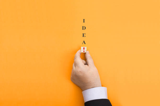 istock Businessman makes the word Idea 1322066471