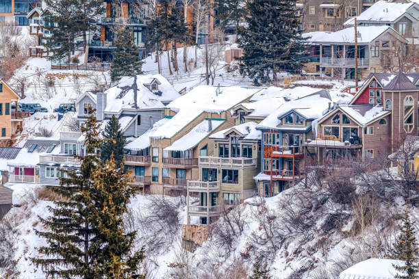 istock Multi storey luxury homes on a mountain town covered with snow in winter 1322067824