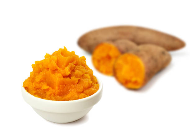 istock Mashed sweet potato isolated. Sweetpotato puree, batata mash 1322078752