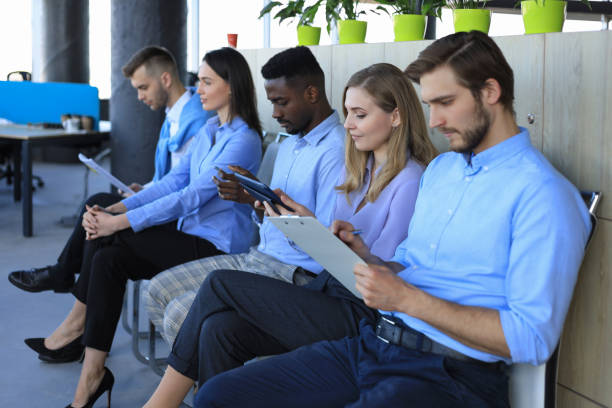 istock Stressful business people waiting for job interview 1322087111