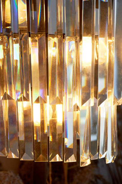 istock Retro floor lamp with glass pendants. macro. Yellow warm light. Interior design 1322087957