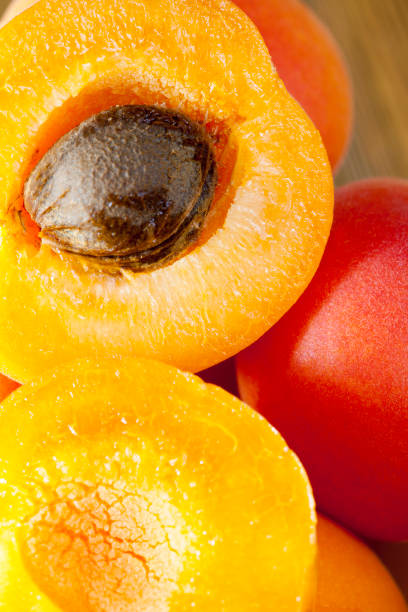 istock cut apricots in a glass white bowl 1322092133