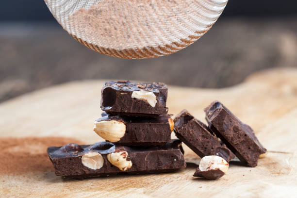 istock divided into parts chocolate bar with whole nuts 1322092750
