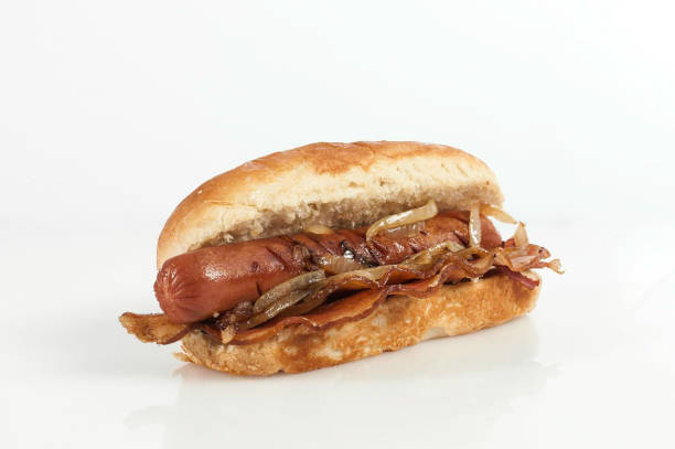 istock Hot dog with bacon and fried onions 1322094030