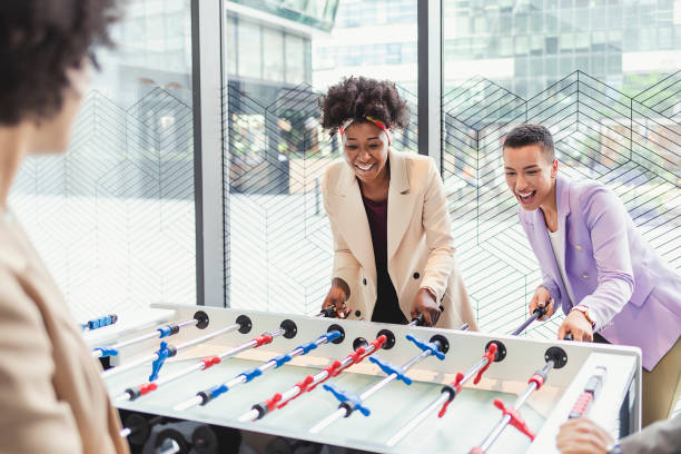 istock Business Colleagues Playing Table Football 1322098535