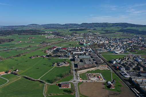 Canton of Zug with Baar. Zug itself is a small town in central switzerland with arround 30'000 residents. The high angle image was captured during a beautiful day in springtime.