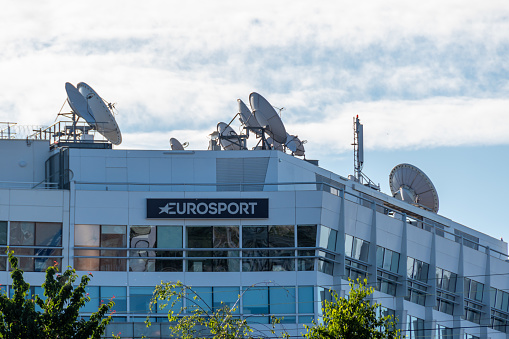 Issy-les-Moulineaux, France - June 6, 2021: Exterior view of the headquarters building of Eurosport. The Eurosport group consists of various television channels specialized in sports