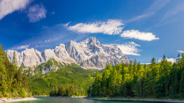 Zugspitze mountain and Eibsee Lake Eibsee, Bavaria, Europe, Garmisch-Partenkirchen, Germany zugspitze stock pictures, royalty-free photos & images