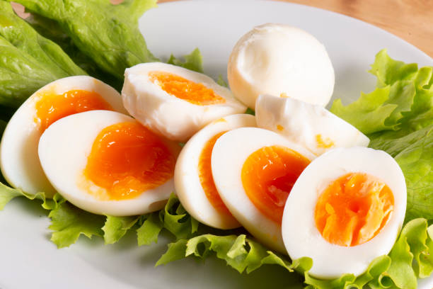 istock boiled eggs are on the lettuce in the white plate 1322100956