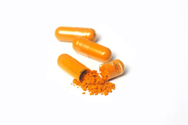 istock Thai herb turmeric with capsule filling For easy use 1322101337