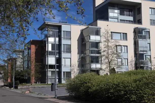 Modern spacious apartment houses in a good neighbourhood near nature, city center and services. Scandinavian architecture. The photo is taken in Oulu, Finland.