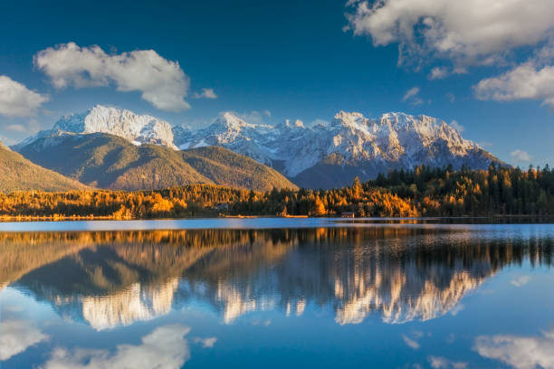View of Eibsee and Zugspitze at dusk in Autumn in 2019 in Bayern, Germany.