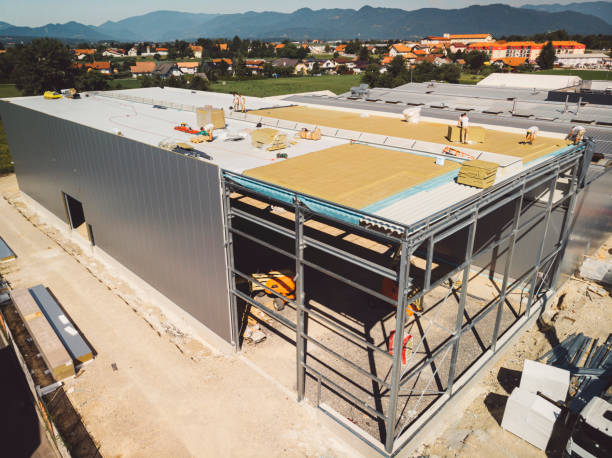 istock Large warehouse under construction in suburban area 1322103402