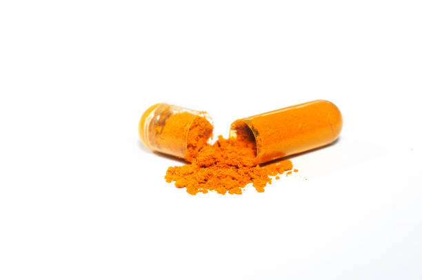 istock Thai herb turmeric with capsule filling For easy use 1322103486