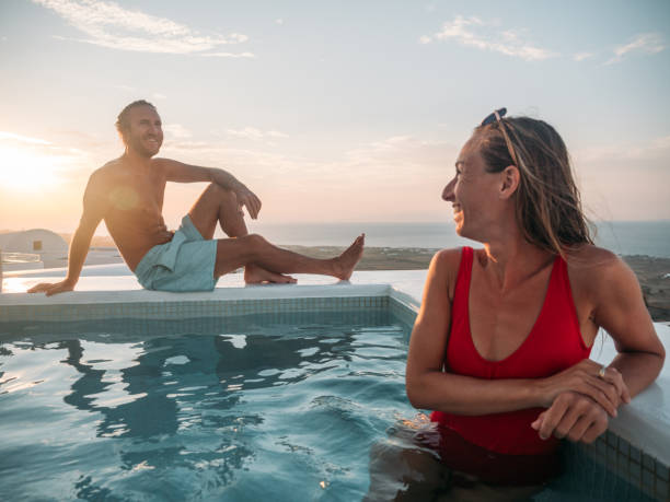 istock Romantic couple enjoy sunset from a hot tub 1322104866