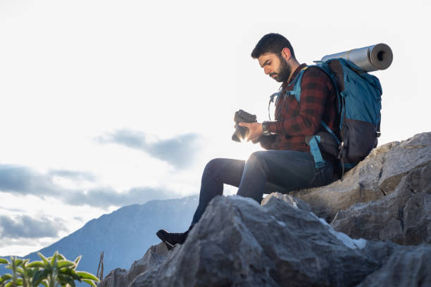 istock Exploring The Mountain And Taking Photos 1322107886