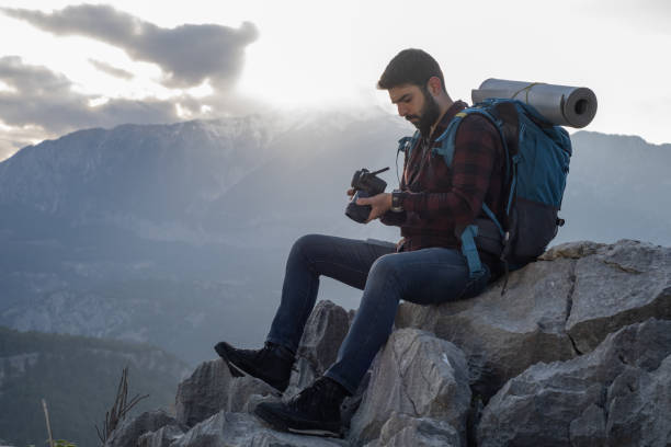 istock Exploring The Mountain And Taking Photos 1322107889