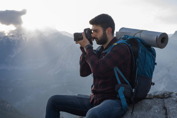 istock Exploring The Mountain And Taking Photos 1322107891
