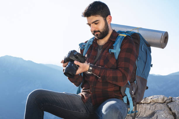 istock Exploring The Mountain And Taking Photos 1322107902