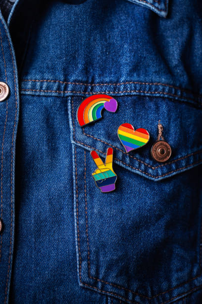 istock Rainbow lgbtq flag badges against denim background, pride month 1322108735