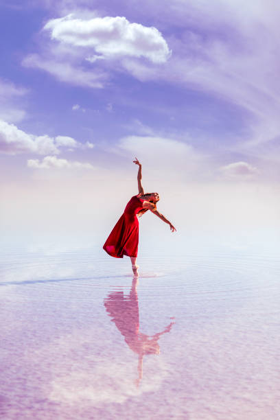 istock Woman in red on lake 1322112457