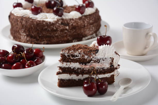 istock Black forest cake, Schwarzwald pie, dark chocolate and cherry dessert on a white background 1322113204