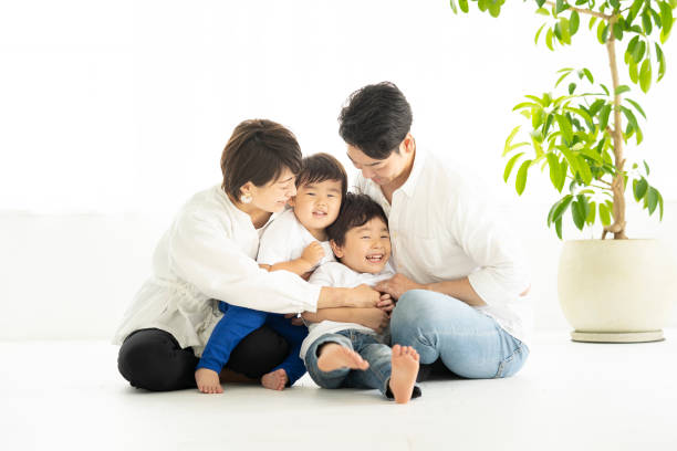 istock Family relaxing in a bright room 1322113326