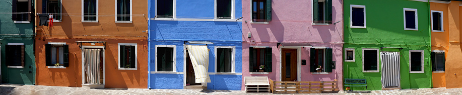 Streetview of the colorful houses at Burano Island, located in the Venetian Lagoon, northern Italy