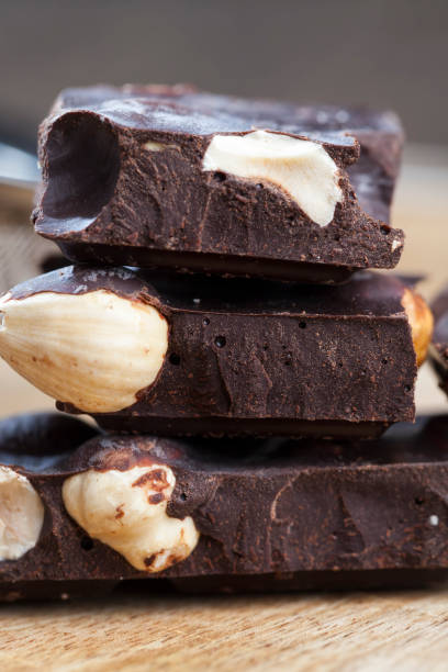 istock divided into parts chocolate bar with whole nuts 1322133812