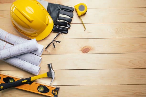 istock Work safety. Standard Construction site protective equipment on  top view wooden background, flat lay, copy space,safety first concepts. 1322135485