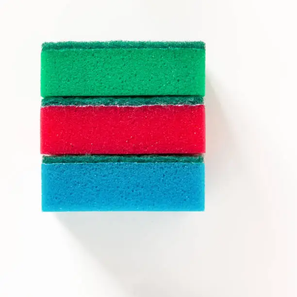3 dish sponge on light background - view from above. High quality photo