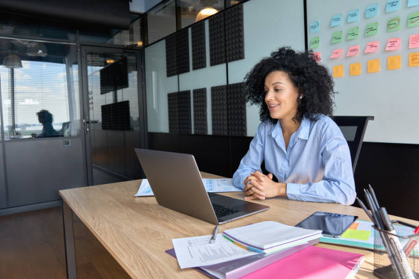 istock African American manager advisor having working video call on pc in office. 1322139123