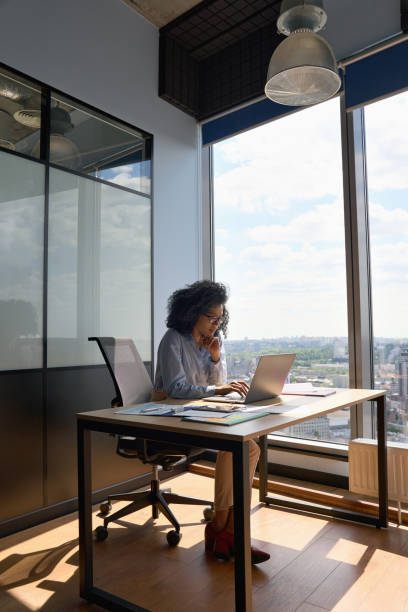 istock Concentrated African American businesswoman working typing using pc laptop. 1322139148