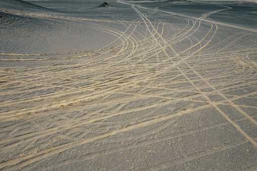 Close up views of the sand dune peaks hills and valleys and footsteps